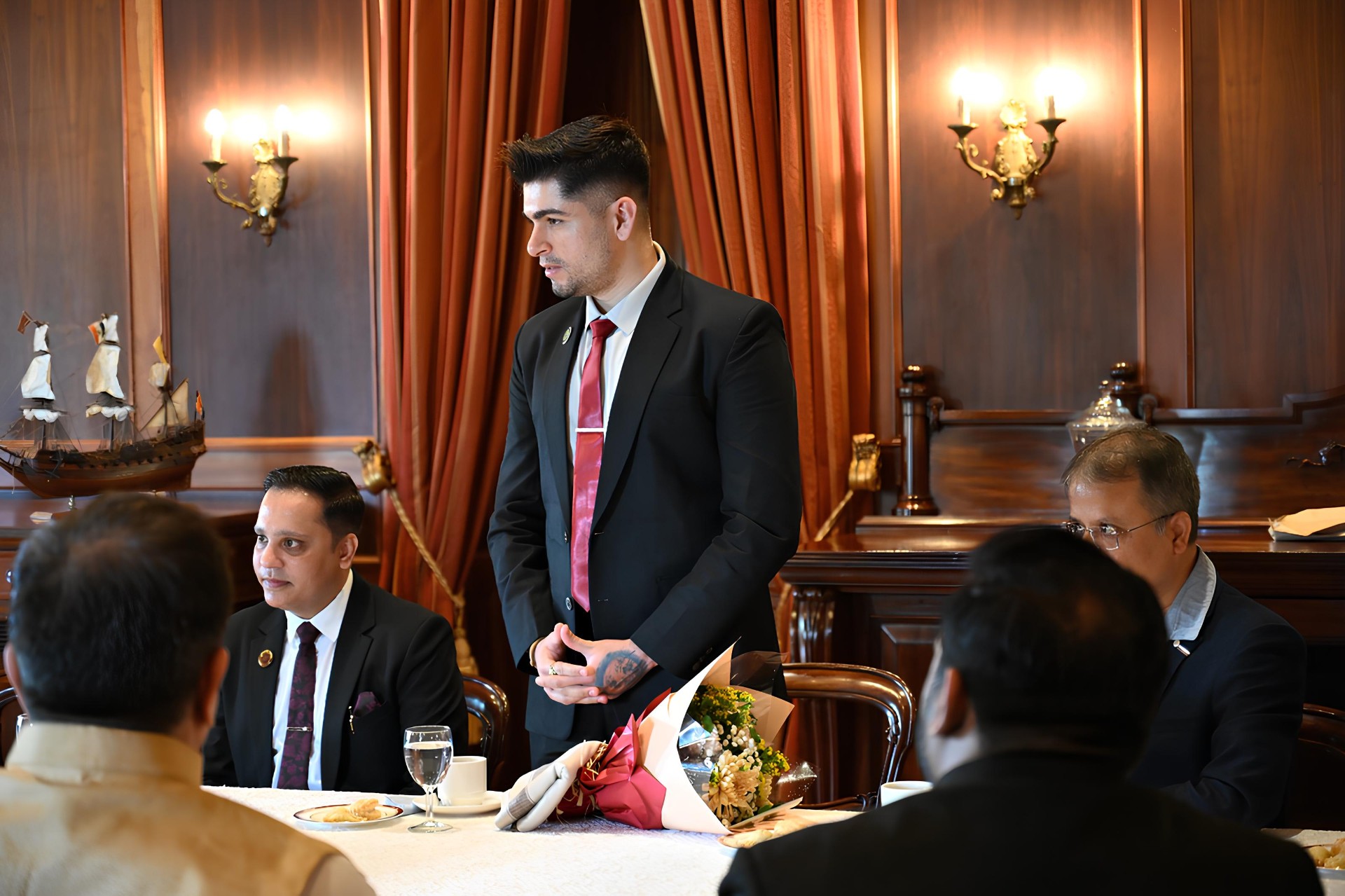 Addressing delegates at the Diplomatic Council chamber.